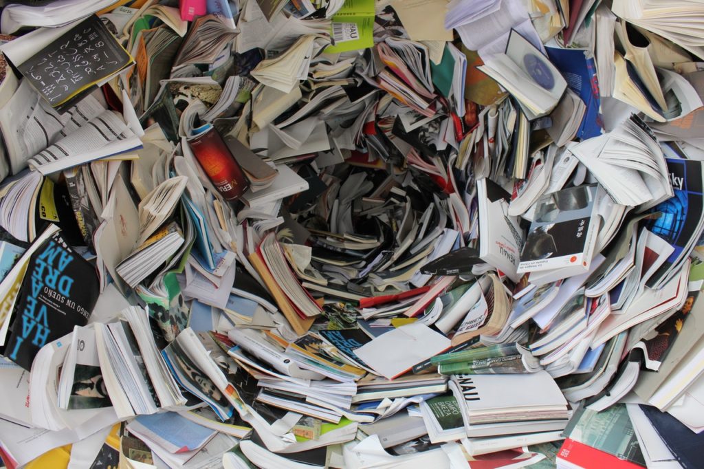 A pile of books for academic research